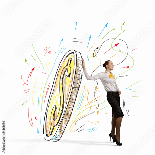 Photo: Businesswoman leaning on dollar sign Businesswoman leaning on dollar sign