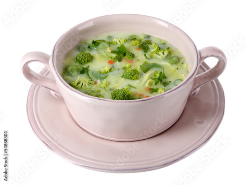 Photo: Cabbage soup in plate isolated on white Cabbage soup in plate isolated on white