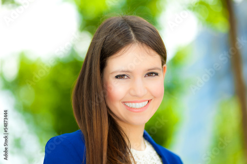 Photo: Smiling businesswoman outdoor Smiling businesswoman outdoor