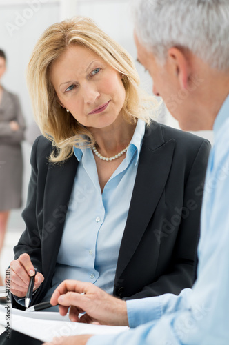 Photo: Business People Working Together Business People Working Together
