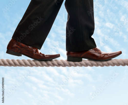 Photo: Tightrope walker businessman Tightrope walker businessman