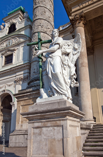 Photo: Statue of an angel in St. Charles Church. Vienna, Austria Statue of an angel in St. Charles Church. Vienna, Austria