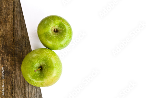 Photo: Green apples and white paper Green apples and white paper