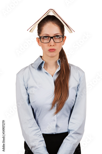Photo: Sad girl with a book on her head Sad girl with a book on her head