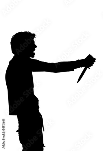 Photo: silhouette of a man attempting suicide knife silhouette of a man attempting suicide knife