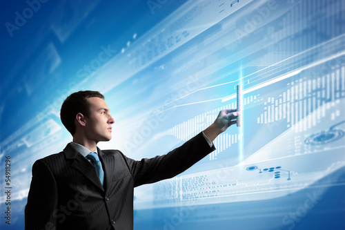 Photo: Businessman and media screen Businessman and media screen