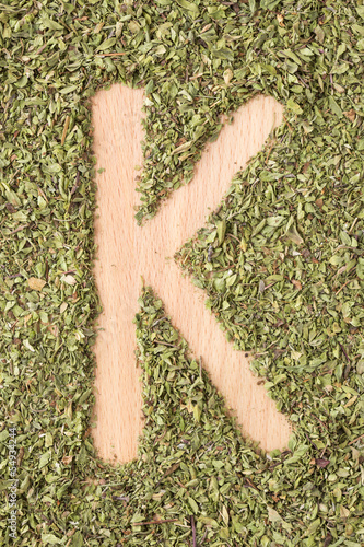 Photo: Letter K written with oregano Letter K written with oregano