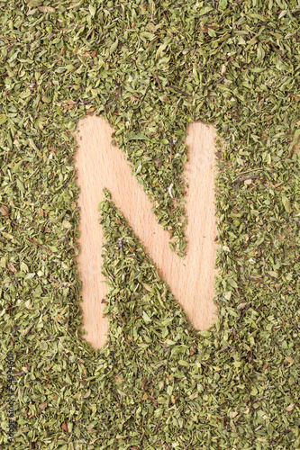 Photo: Letter N written with oregano Letter N written with oregano
