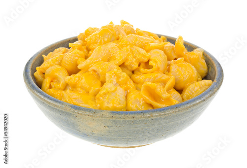 Photo: Pasta shells with cheese sauce in bowl Pasta shells with cheese sauce in bowl