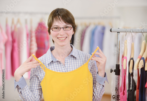 Photo: Woman shopping for clothes Woman shopping for clothes