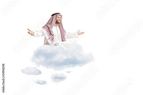 Photo: Young arab person sitting on a cloud Young arab person sitting on a cloud