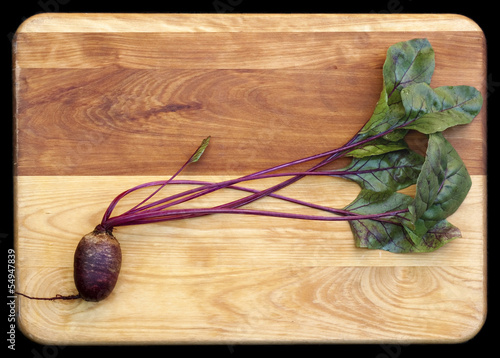 Photo: Red Beets on Cutting Board Red Beets on Cutting Board