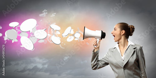 Photo: businesswoman with megaphone businesswoman with megaphone