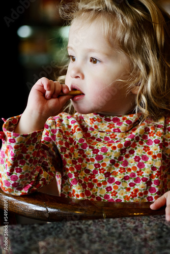 Photo: toddler girl in cafe toddler girl in cafe