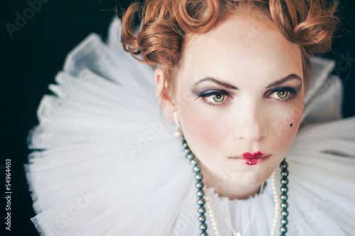 Photo: Portrait of red-haired woman in frill Portrait of red-haired woman in frill