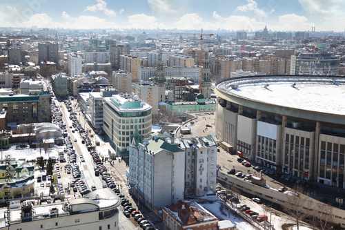 Photo: Sports complex stands against city landscape at winter Sports complex stands against city landscape at winter