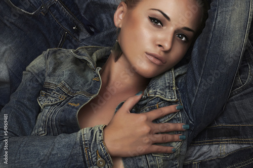 Photo: fashion beautiful girl. denim jeans wear. beauty woman fashion beautiful girl. denim jeans wear. beauty woman