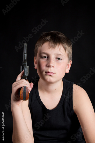 Photo: teenager with a gun teenager with a gun