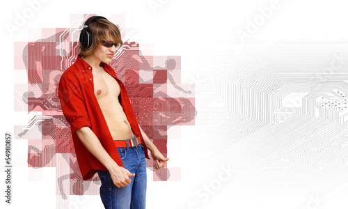 Photo: Happy smiling young man dancing Happy smiling young man dancing