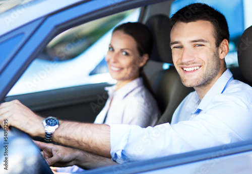 Photo: Couple inside car Couple inside car