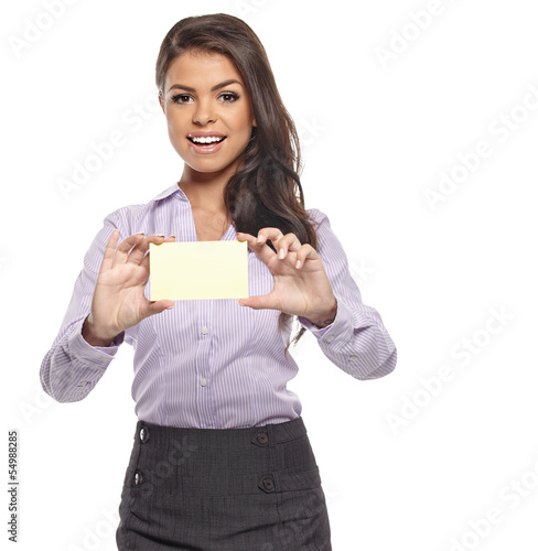 Photo: Business card woman. Young casual smiling woman showing blank bu Business card woman. Young casual smiling woman showing blank bu