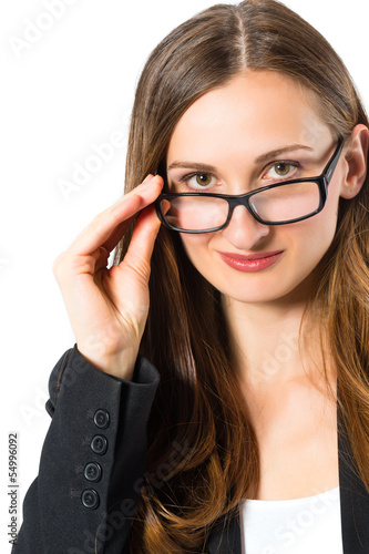Photo: Young woman with glasses looking Young woman with glasses looking