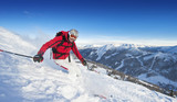 Photo: Österreich, Salzburg Land, Altenmarkt-Zauchensee, Mann Skifahren auf Skipiste im Winter Österreich, Salzburg Land, Altenmarkt-Zauchensee, Mann Skifahren auf Skipiste im Winter