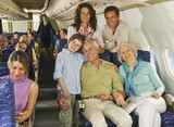 Photo: Deutschland, München, Bayern, Gruppe von Passagieren in der Economy-Klasse Verkehrsflugzeug Deutschland, München, Bayern, Gruppe von Passagieren in der Economy-Klasse Verkehrsflugzeug