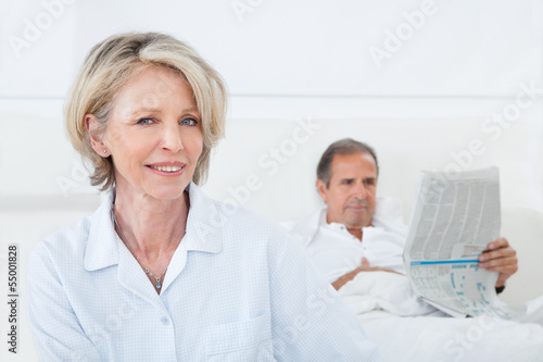 Photo: Happy Woman Sitting In Front Of Man Happy Woman Sitting In Front Of Man