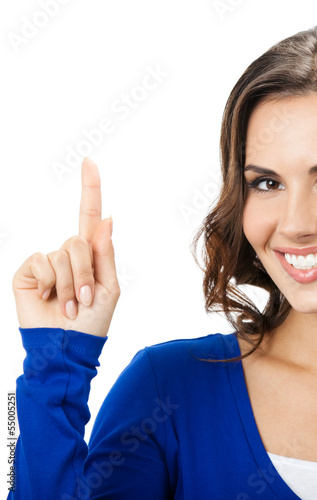 Photo: Beautiful young woman showing, on white Beautiful young woman showing, on white