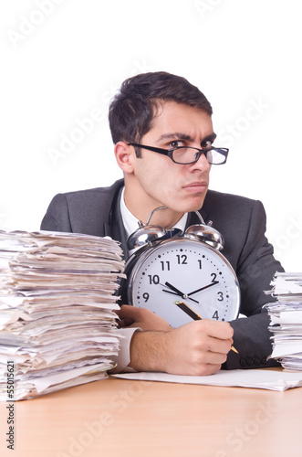 Photo: Woman businessman with giant alarm clock Woman businessman with giant alarm clock