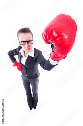 Photo: Woman with boxing gloves on white Woman with boxing gloves on white
