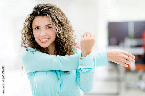 Photo: Business woman stretching Business woman stretching
