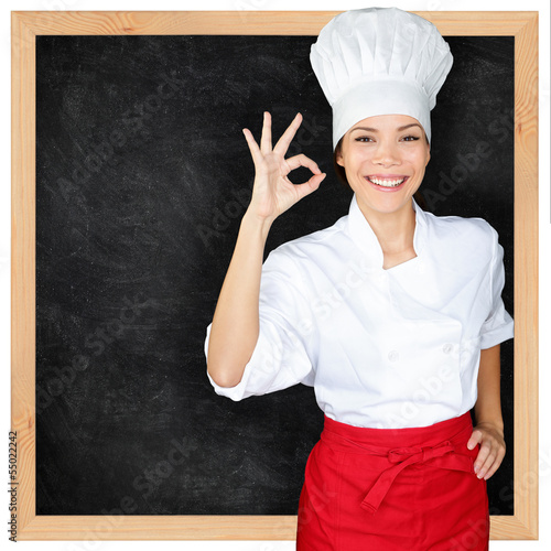 Photo: Chef showing menu blackboard and Perfect hand sign Chef showing menu blackboard and Perfect hand sign