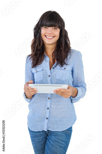 Photo: Cute woman holding tablet pc Cute woman holding tablet pc