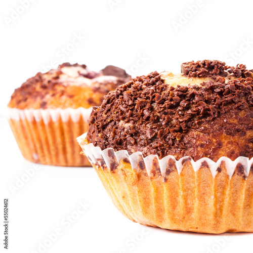 Photo: Muffin with chocolate sprinkles isolated on white background, ma Muffin with chocolate sprinkles isolated on white background, ma