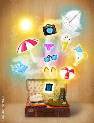 Photo: Tourist bag with colorful summer icons and symbols Tourist bag with colorful summer icons and symbols