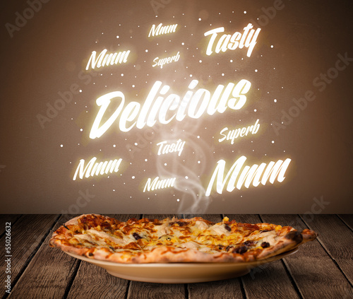 Photo: Pizza with delicious and tasty glowing writings Pizza with delicious and tasty glowing writings