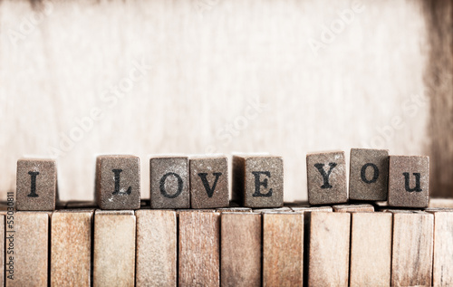 Photo: Wood cube make message "i love you" Wood cube make message "i love you"