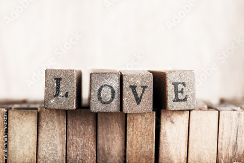 Photo: Wood cube make word, "love" Wood cube make word, "love"