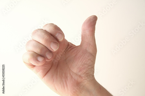 Photo: hand gesture of thumb up hand gesture of thumb up
