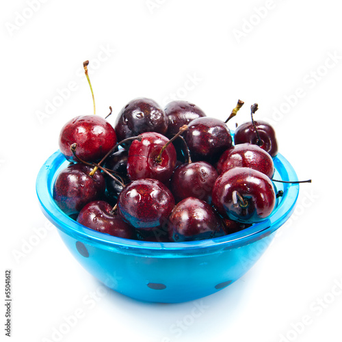 Photo: Fresh cherries in bowl isolated on white Fresh cherries in bowl isolated on white