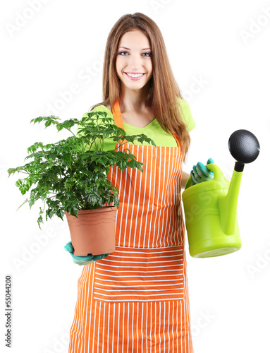 Photo: Beautiful girl gardener with flower isolated on white Beautiful girl gardener with flower isolated on white