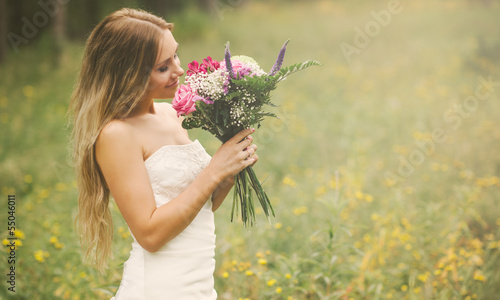 Photo: a beautiful bride in her wedding dress a beautiful bride in her wedding dress