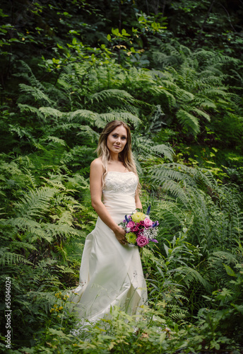 Photo: bride in a green forest bride in a green forest