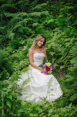 Photo: bride in a green forest bride in a green forest
