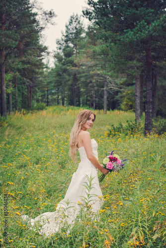Photo: a beautiful bride in her wedding dress a beautiful bride in her wedding dress
