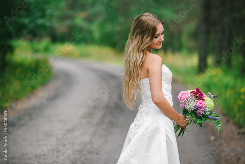 Photo: a beautiful bride in her wedding dress a beautiful bride in her wedding dress