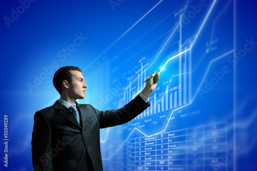 Photo: Businessman and media screen Businessman and media screen