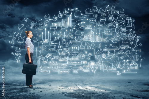 Photo: Business woman and business project Business woman and business project